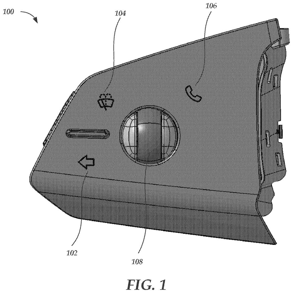 A steering wheel button assembly with a scroll wheel, showing various control icons for vehicle functions. Drawing from patent filing US 2026/0274324 A1.