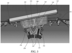 Patent drawing: Tesla Patents a Motorized Mechanism That Lifts Dashboard Screens Without Scratching Them
