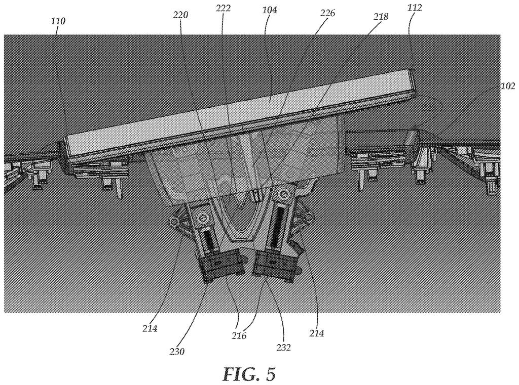 A dashboard screen in a tilted, raised position, revealing the motorized mechanism that lifts it. Drawing from patent filing US 2026/0285240 A1.