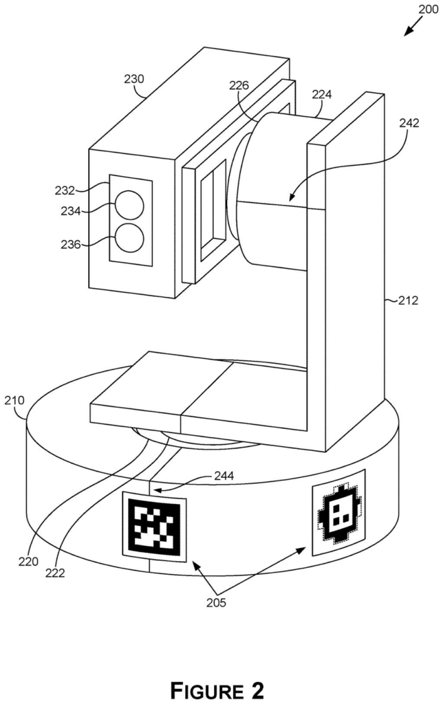 A 3D perspective view of the gaze target projector, showing its base, support arm, and projection device with lenses and sensors. Drawing from patent filing US 2026/0301433 A1.