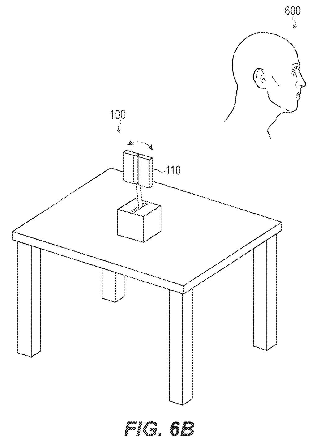 OpenAI patent drawing of a tabletop assistant raising an arm and waving its panels at a person looking away