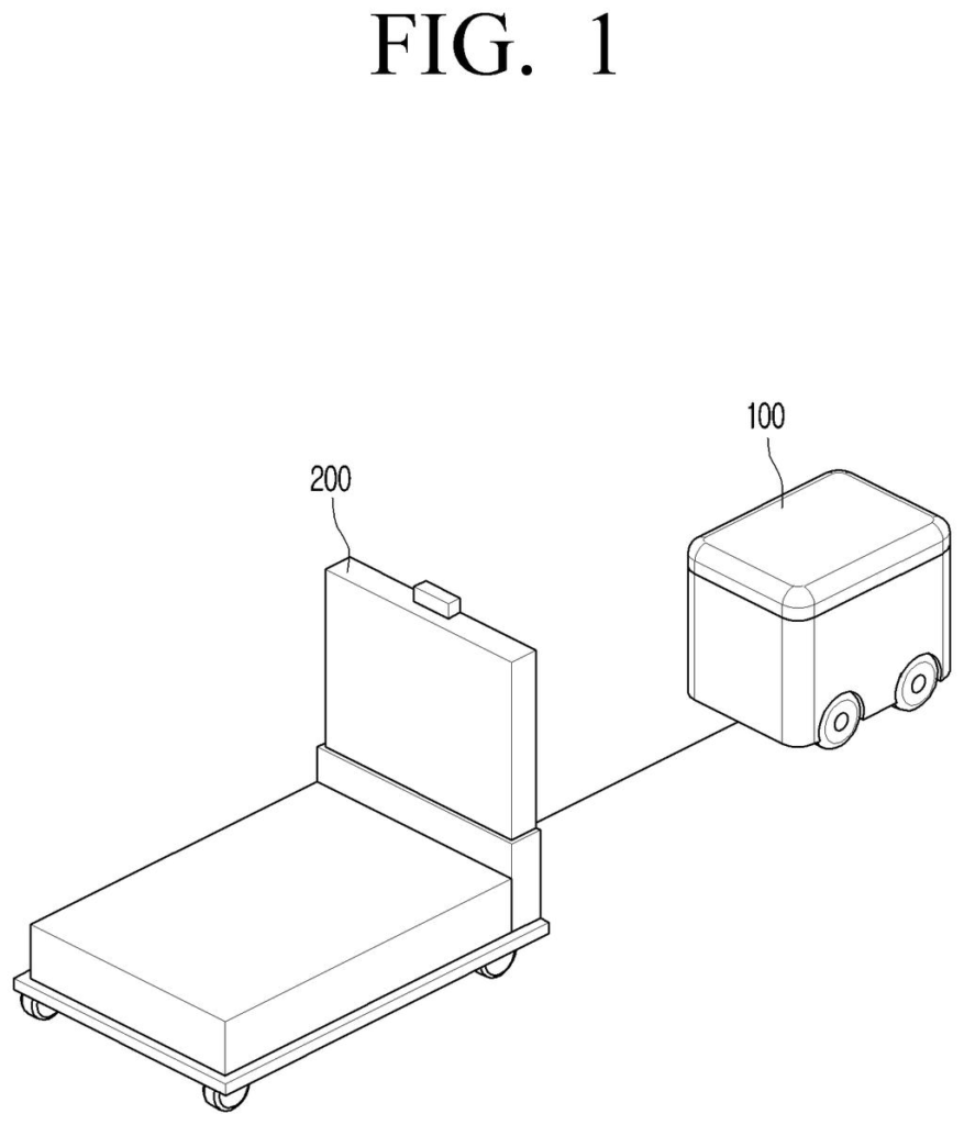 A delivery robot connects to a motorized cart to guide it along warehouse paths. Drawing from patent filing US 2026/0319510 A1.